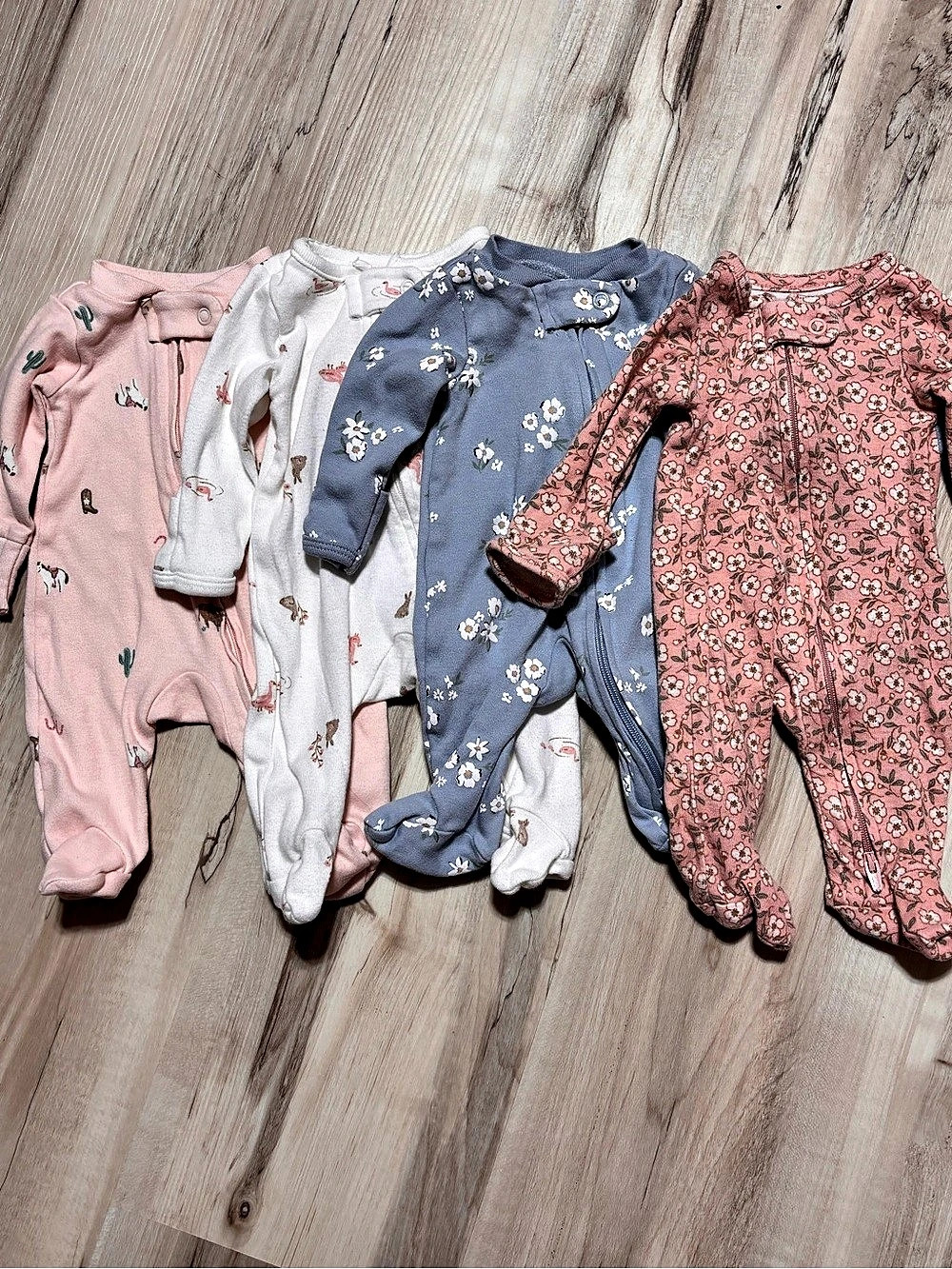 Lot of 4 Carter's Baby Footie Pajama sleepers in size premie
